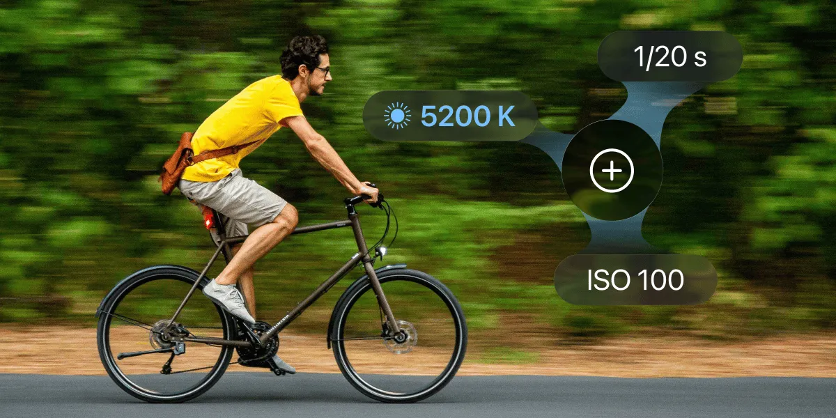 Cyclist panned at speed, with a custom preset showing 5200 K, 1/20 s and ISO 100